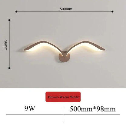 Brown wall lamp with nordic avian style wing design and warm white illumination for indoor bedroom use