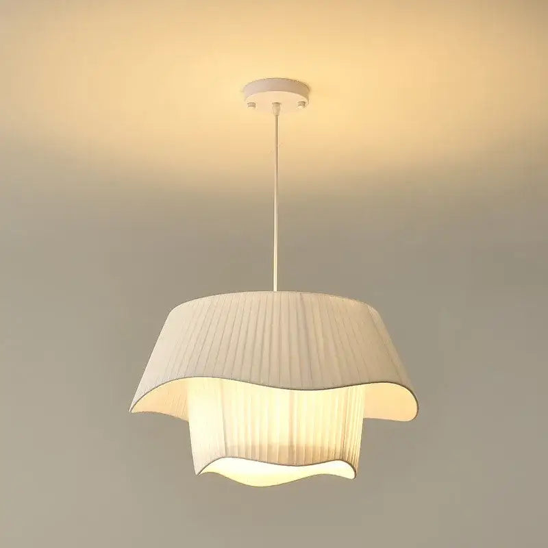 Modern white pleated fabric pendant light with curved layered design and slender rod suspension for decorbites creamy style e27