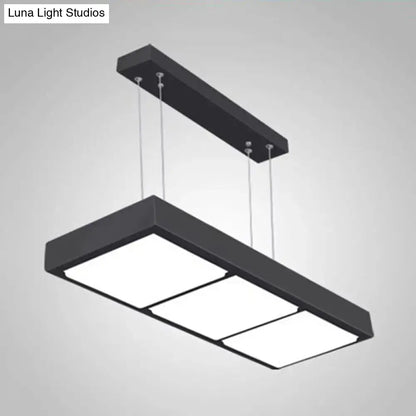 Modern black metal rectangular island lamp with three illuminated panels suspended by thin cables for office lighting