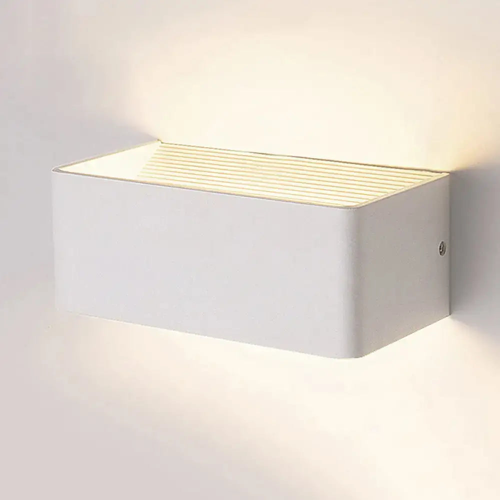 Modern white rectangular wall lamp with sleek horizontal slats for warm white bedroom lighting and stylish wall sconce design