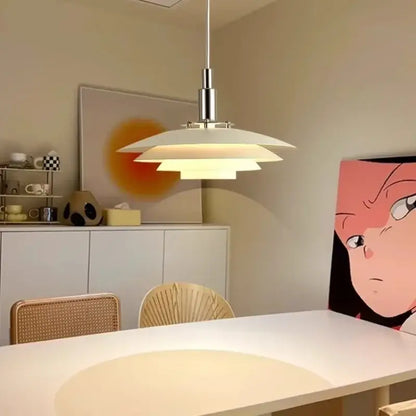 Modern white layered pendant light with sleek chrome finish and adjustable cord for modern interiors and kitchen use