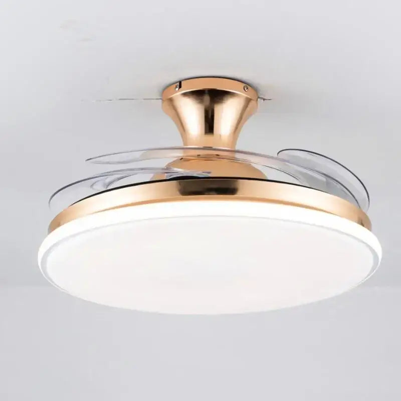 A modern white remote control ceiling fan with light featuring a gold metal frame and transparent blades by decorbites ceiling fans
