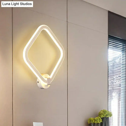 Modern white rhombus frame wall lamp with glowing diamond-shaped led for bedroom sconce lighting