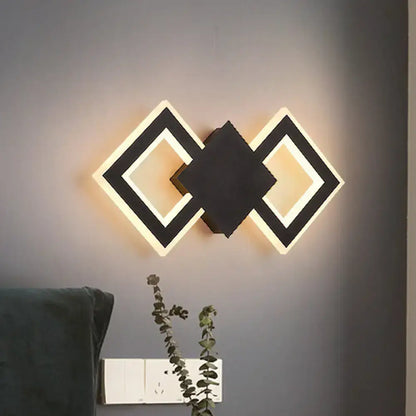 Modern black and white geometric led wall sconce with illuminated diamond frames and white warm light type for bedroom use