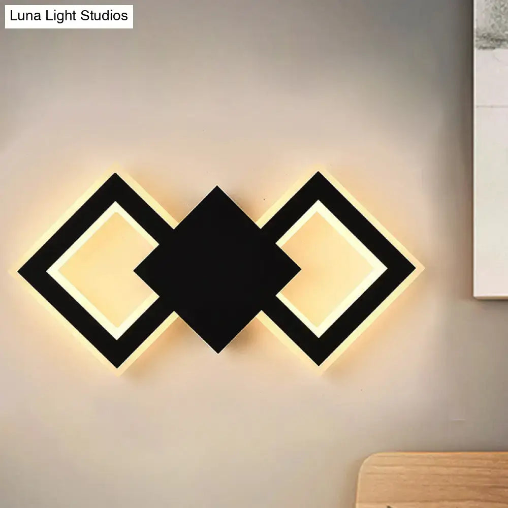Modern white rhombus led wall sconce with white warm light and illuminated black geometric diamond panels maximum bulb wattage included
