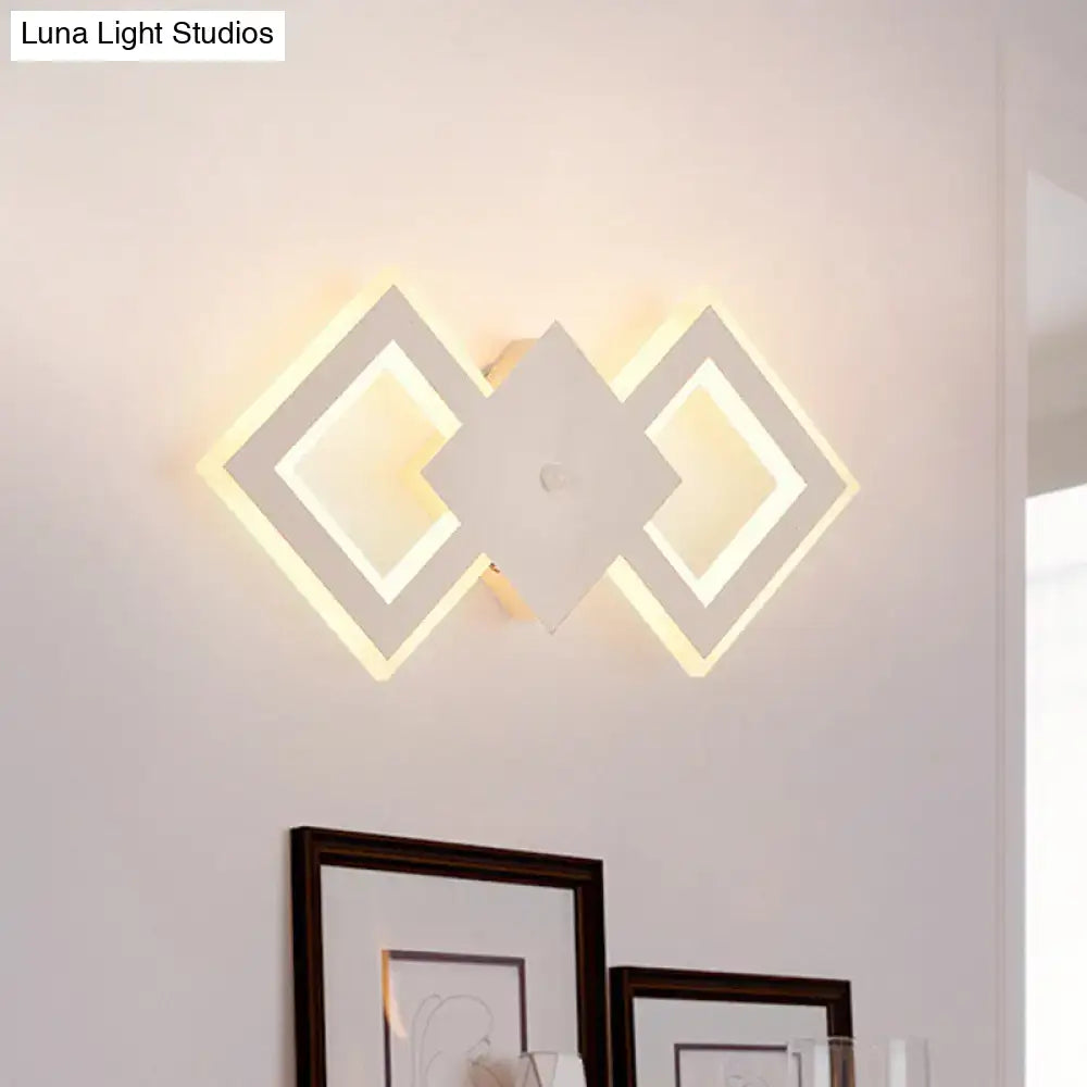 Modern white rhombus led wall sconce with illuminated diamond frames providing white warm light and maximum bulb wattage details
