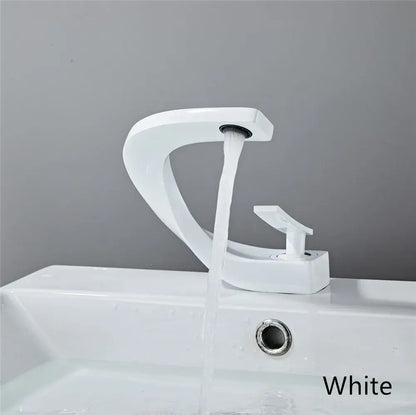 Modern white basin faucet with sleek curved design and elegant rose gold finish for bathroom waterfall tap