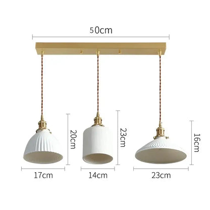 Set of three modern white textured ceramic led pendant lights with gold fixtures and braided cords for kitchen decorbites ceramic led
