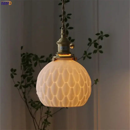 Modern white textured glass ceramic led pendant light with cream honeycomb pattern and brass hardware for kitchen decorbites ceramic led