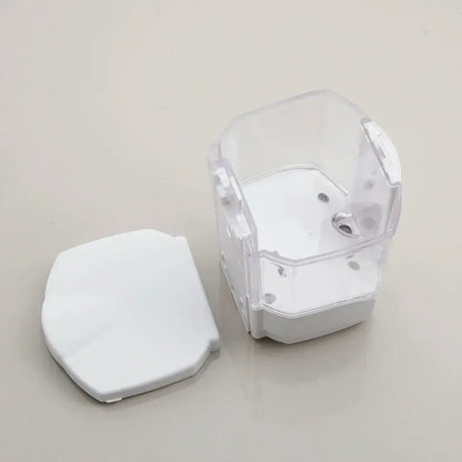 Clear plastic liquid soap dispenser with white lid and compartments for wall mounted automatic kitchen use