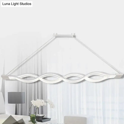 Modern white led pendant light with sleek wave-like design and minimalist frame for dining room island lighting