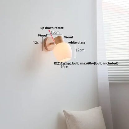 Minimalist wall sconce with natural wood base and frosted amber glass led shade for modern bedroom decorbites amber glass lighting