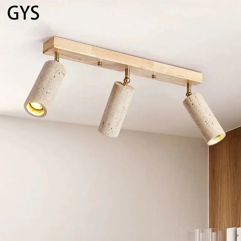 Modern wood and beige concrete led ceiling spotlight with surface mounted led cylinders on brass fittings for living room