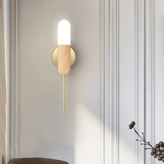 Modern wood and brass led light fixture wall sconce with frosted glass cylinder and light wood base for living room lighting
