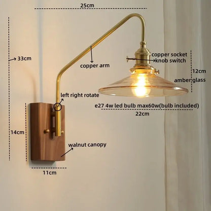 Modern wood and copper led wall sconce with amber glass copper led shade and walnut canopy for bedroom or stair lighting