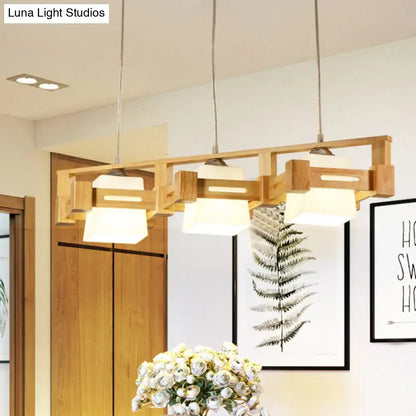 Decorbites modern cubic pendant lamp with wood cage, frosted glass island shades, and three beige bulbs