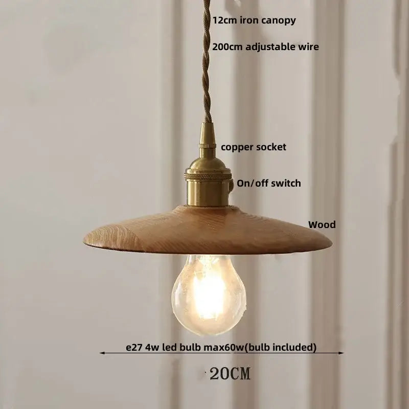 A warm-toned wooden pendant light with brass copper socket and exposed led bulb for modern glass pendant lamp designs