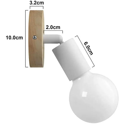 Minimalist wall sconce with light wood base white matte arm and led wood wall light featuring an opaque bulb