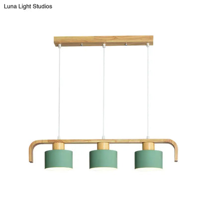 Modern wood and mint green 3 light chandelier with matte sage green shades for dining room kitchen lighting