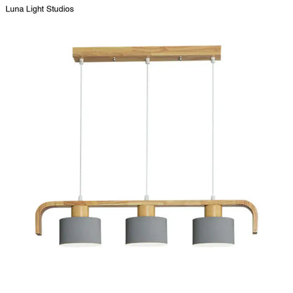 Modern three-light pendant lamp with light wood frame and matte gray shades for dining room kitchen lighting using led incandescent fluorescent bulbs