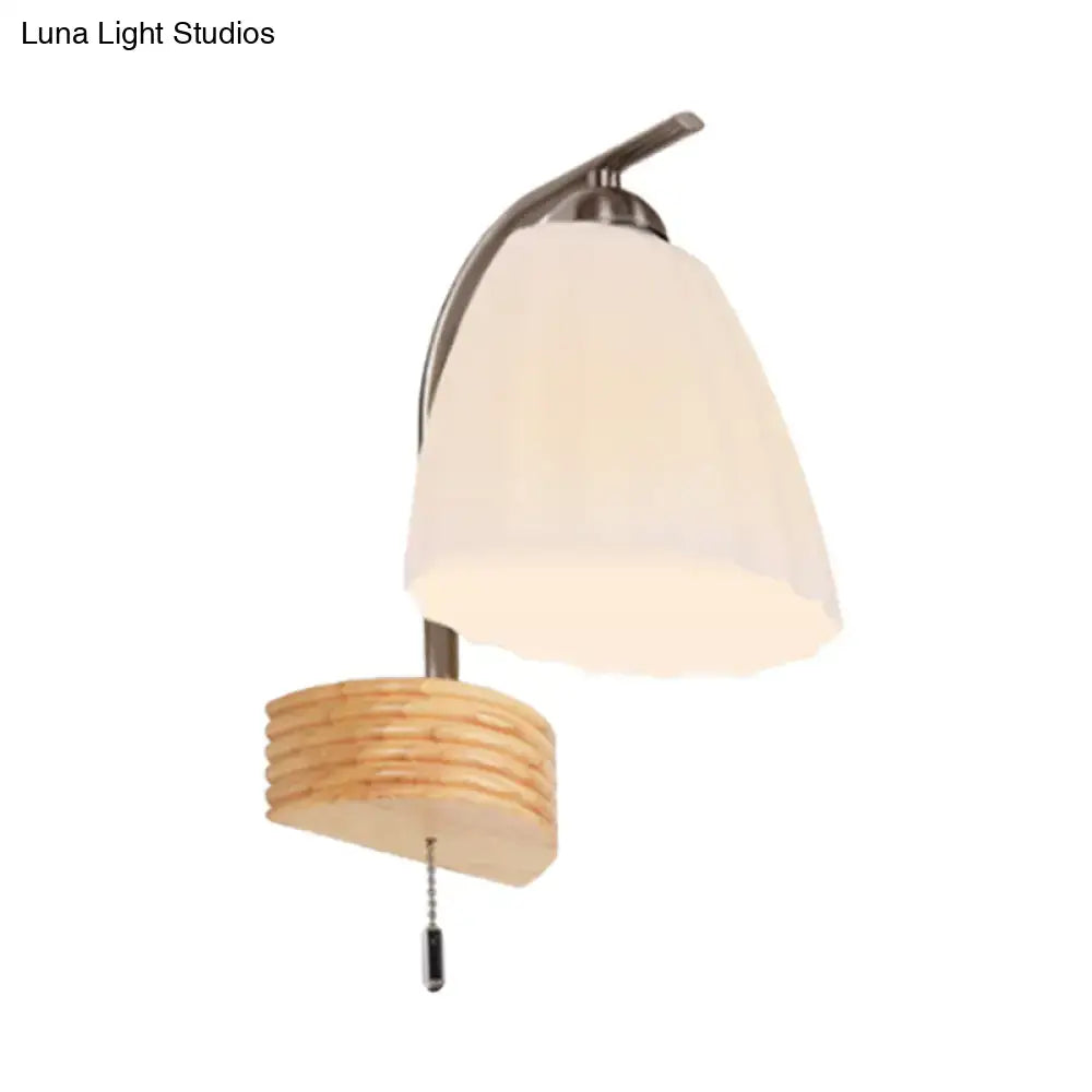 Modern wood and ribbed glass flared sconce wall lamp with brushed nickel arm and off-white frosted shade for bedroom