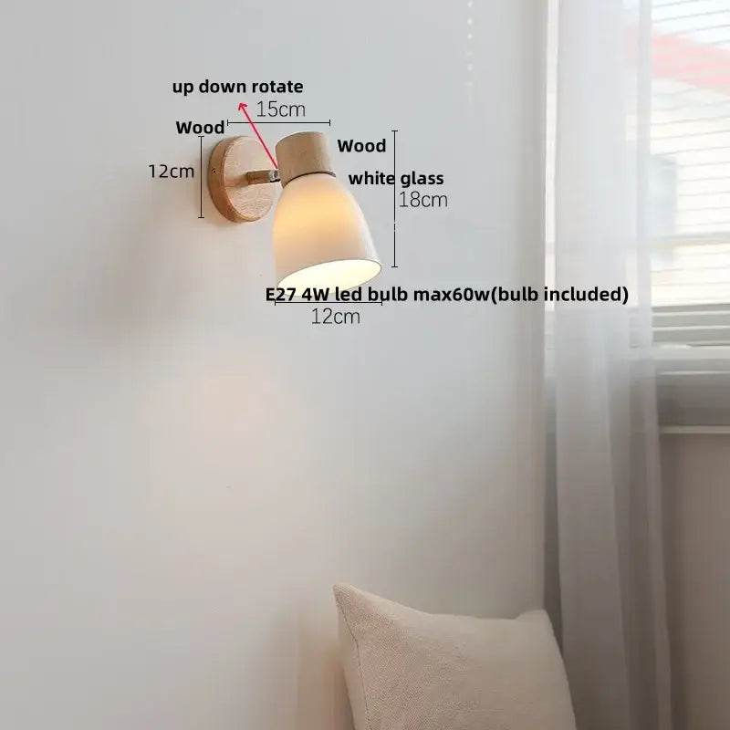 Modern wood and ribbed glass wall light fixture with natural wood base and adjustable white glass shade for bedroom use