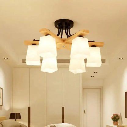 Modern wood and black semi flush mount living room light with milk glass shade and five frosted white glass arms
