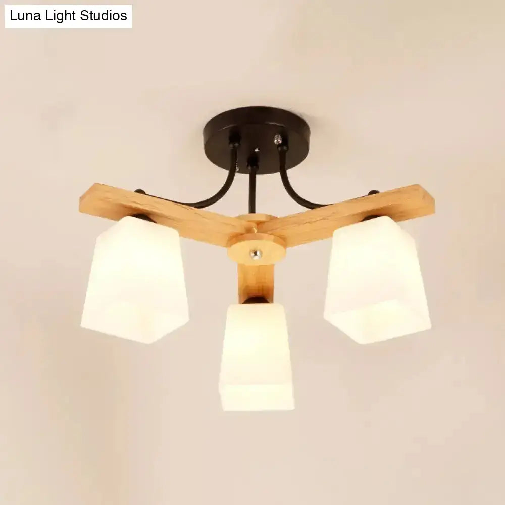 Modern wood and black metal semi flush mount ceiling light with three frosted milk glass shades for living room use