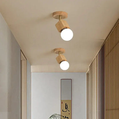 Modern wood and copper led ceiling light featuring two adjustable minimalist wooden spotlights with frosted glass bulbs for bedroom decorbites cube wood copper
