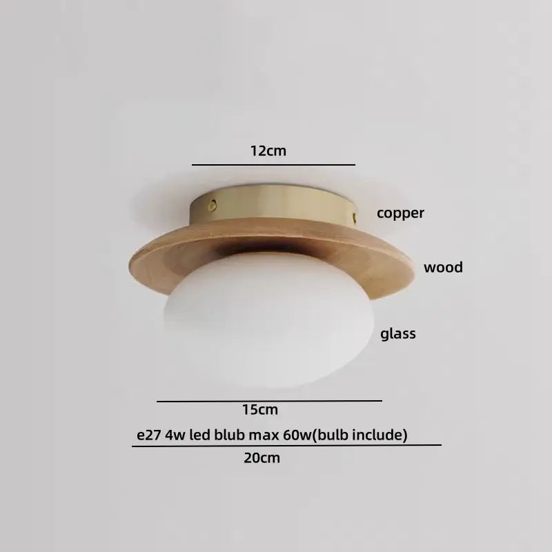 Minimalist ceiling light with copper-finished metal base, wooden ring, and white glass globe for bedroom decorbites cube wood copper