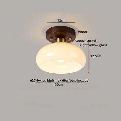 Modern wood and copper ceiling light with rounded yellow glass dome and dark wood base for bedroom decorbites cube wood copper