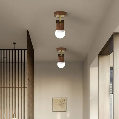 Modern wood and copper led ceiling light with dark wood square bases and brass accents featuring frosted glass bulbs for bedroom decorbites cube wood copper