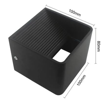 Black rectangular decorbites led wall light with ribbed top and 100mm by 80mm for modern wooden cube bedroom sconce