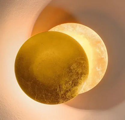 Modern wooden cube led wall sconce with a golden textured metallic finish and warm ambient lighting decorbites led wall sconce
