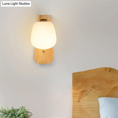 Modern wooden wall lamp with warm-toned frosted milky glass globe and natural wood base 220v-240v fixture type