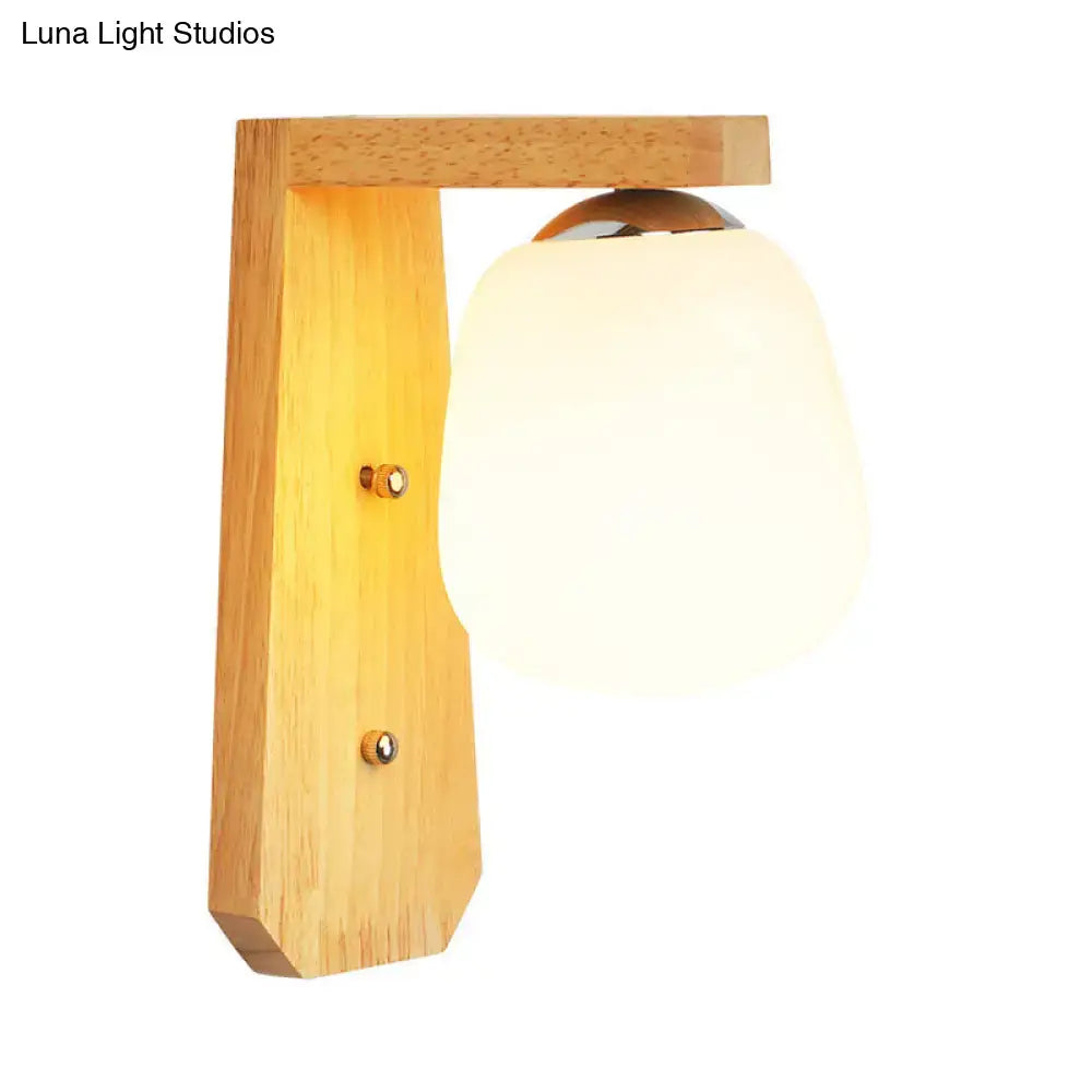 Modern wooden wall lamp with warm tones frosted glass globe and chrome accents fixture type 220v-240v bedroom use