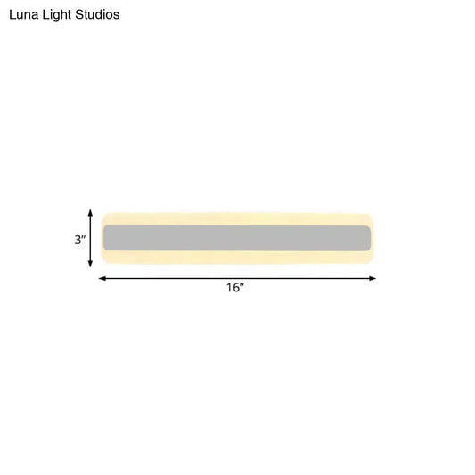 Modern yellow and gray led white light strip bathroom vanity fixture with pale yellow casing and central gray illuminated band