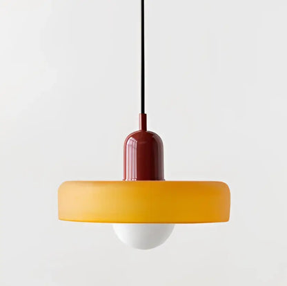 Modern yellow and olive green glass chandelier pendant light featuring a matte red and amber frosted pendant light