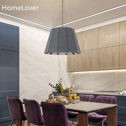 Gray pleated echo felt pendant light fixture designed as a modern felt pendant light for dining room use