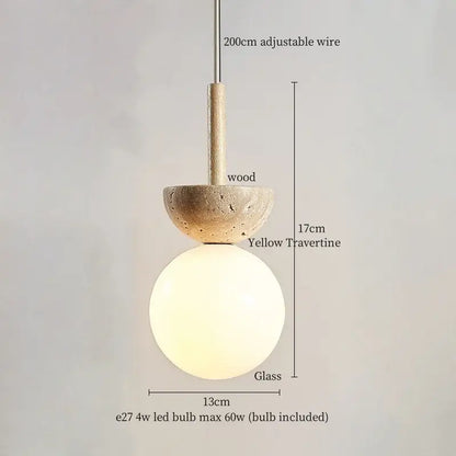 Modern yellow travertine led pendant lights with a warm frosted glass globe and wooden accent for kitchen island decorbites
