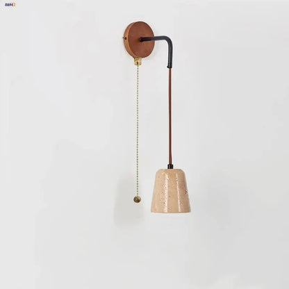 Modern yellow travertine led wall lamp featuring a beige speckled ceramic pendant with wooden base and black metal arm decorbites led yellow
