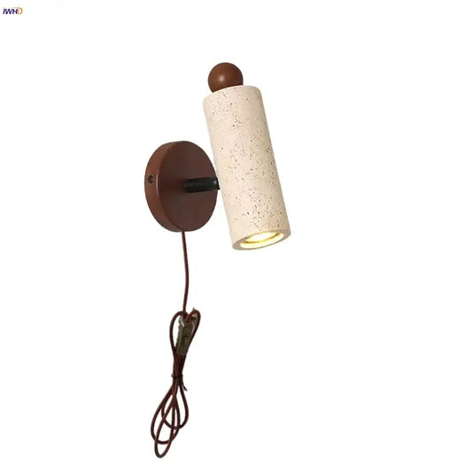 Modern yellow travertine led wall sconce with cream speckled cylindrical design and dark brown base for bedroom decorbites led wall use