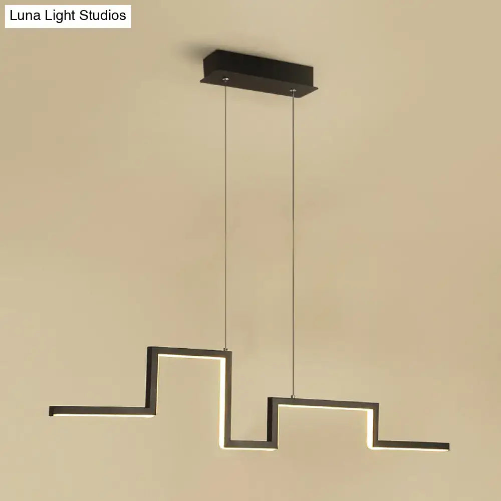 Modern black linear metal hanging light fixture with illuminated zigzag geometric design for dining room use