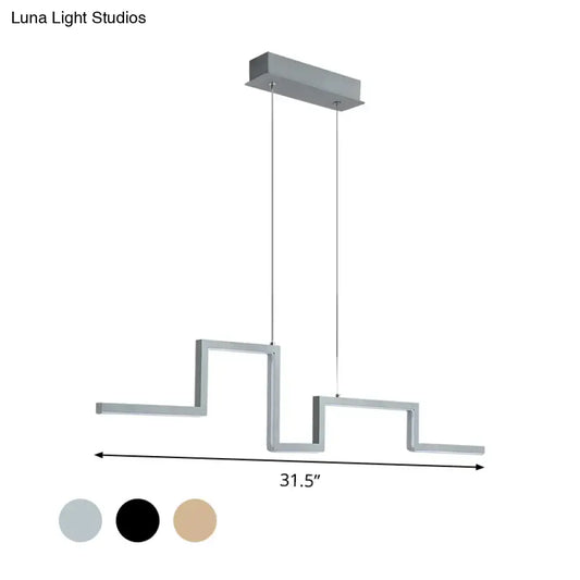 Modern silver linear metal hanging light fixture with geometric zigzag design and rectangular ceiling mount for dining room