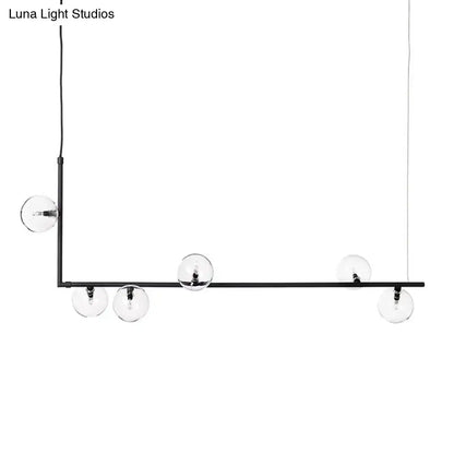 DecorBites modernist black metal chandelier with five clear glass globe bulbs and right angled frame in warm white lighting