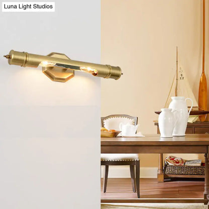 Modernist brass tube wall sconce with hexagonal backplate designed for 110-120v and maximum bulb wattage use