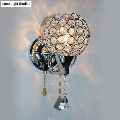 Modernist chrome and crystal wall sconce light with spherical globe and teardrop crystals direct wired electric fixture