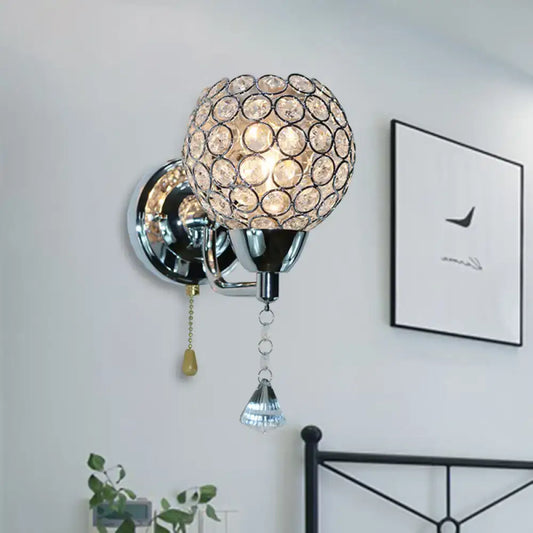 Modernist chrome and crystal wall sconce light with spherical globe and teardrop pendant direct wired electric fixture