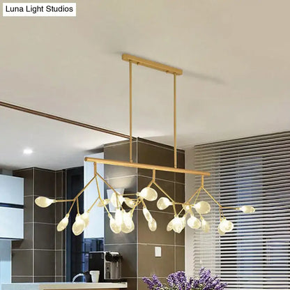 Gold-toned decorbites™ firefly hanging island light with modernist clear glass globes and delicate branch-like arms