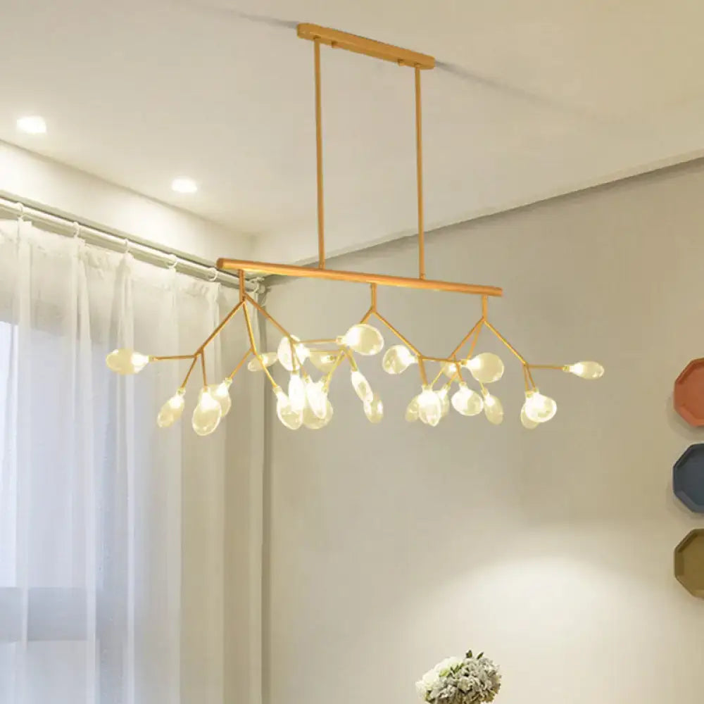 Gold-toned DecorBites modernist clear glass firefly hanging island light with delicate branch arms and teardrop bulbs